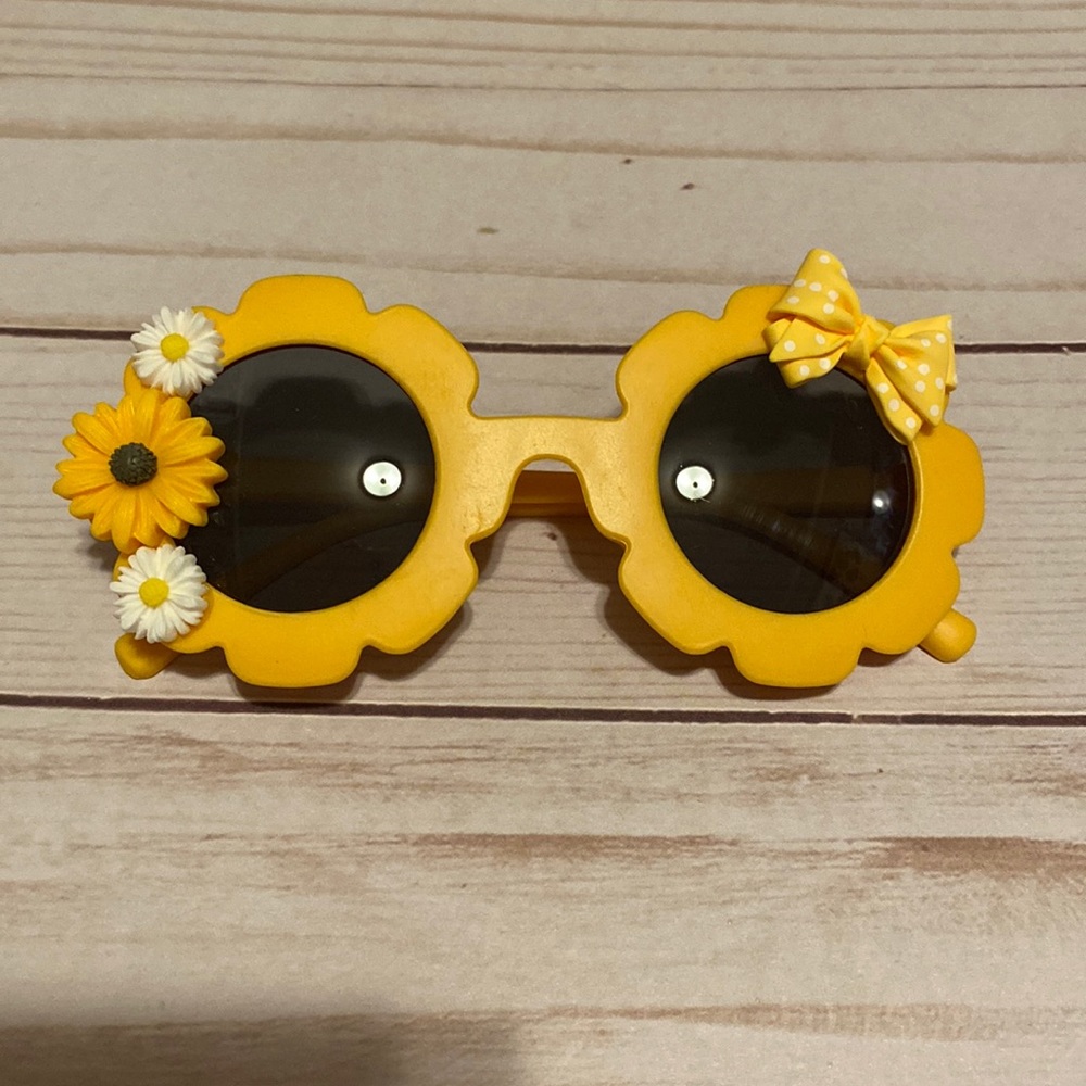 Girls yellow flower shaped sunglasses